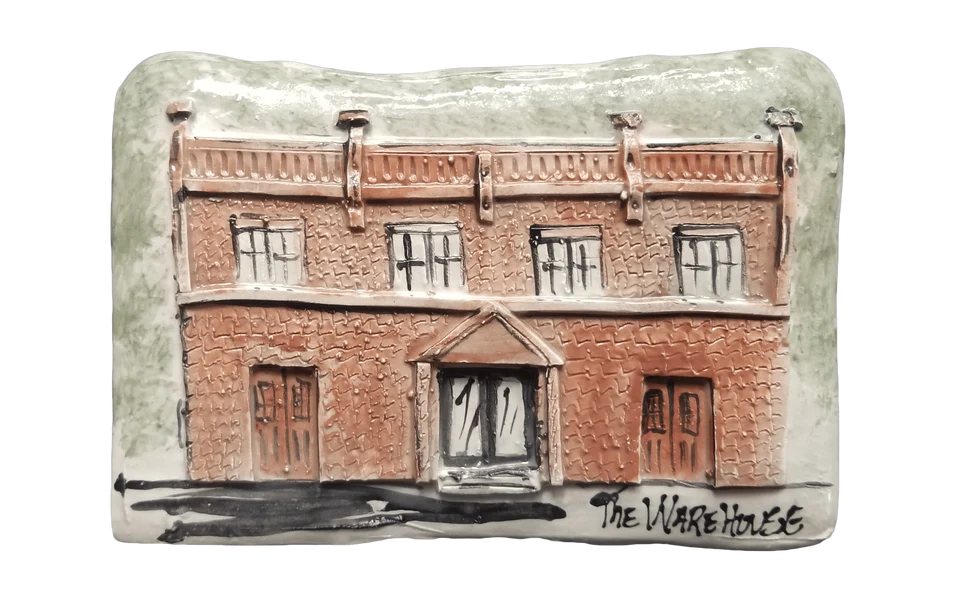 The Warehouse Plaque